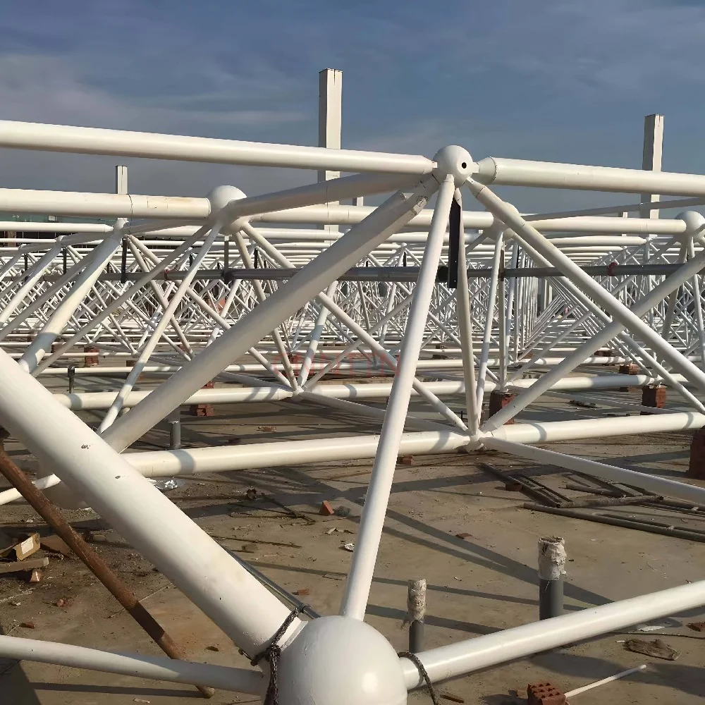 Tubular member layout during assembly. Image from the supplied site archive; project identity is not documented here.